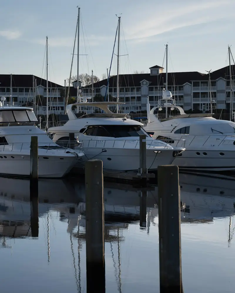 Boats moored in a marina, marine batteries supplied by Barns Industrial Battery Services